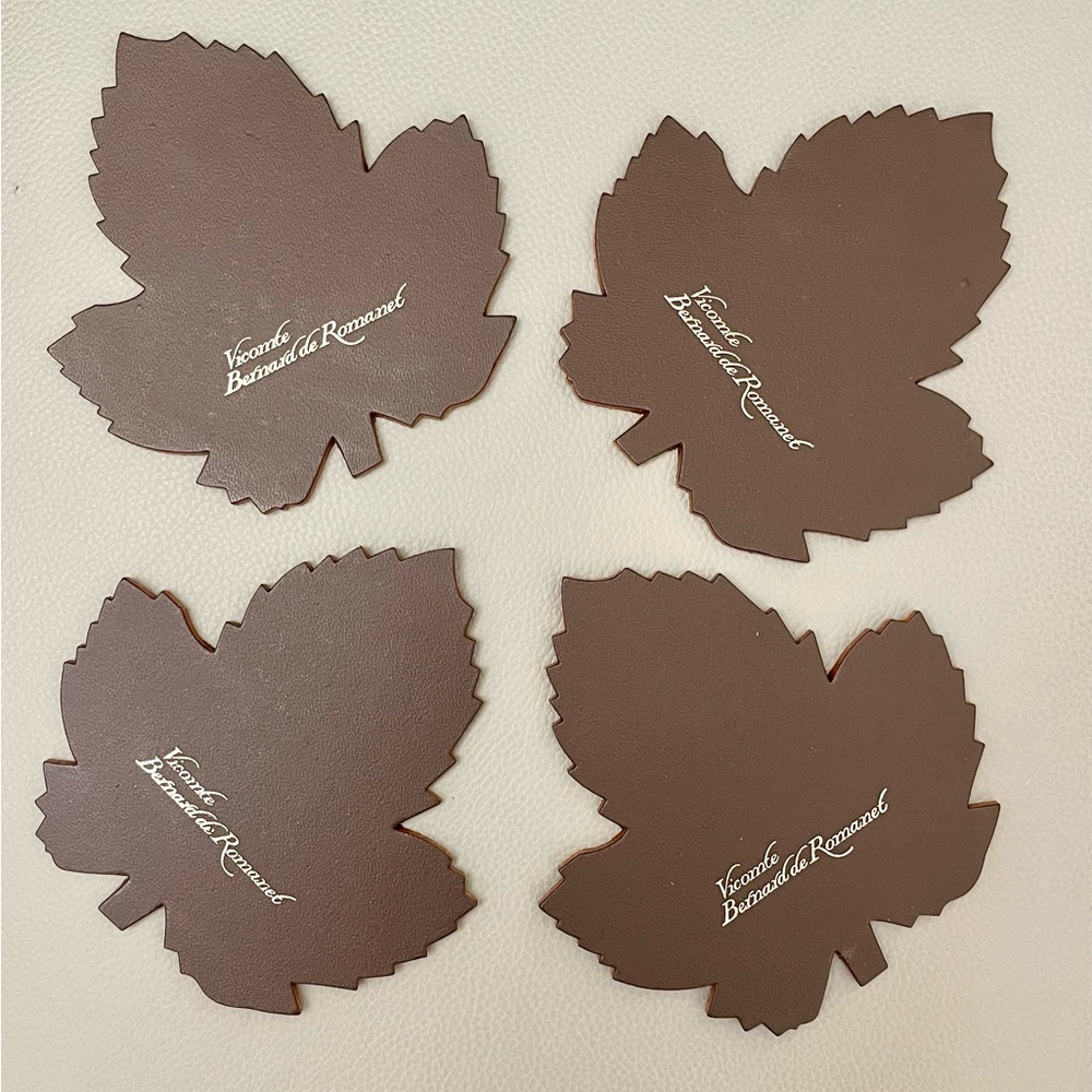NIB Set of 4 Brown, Leather, Leaf-Shaped Coasters